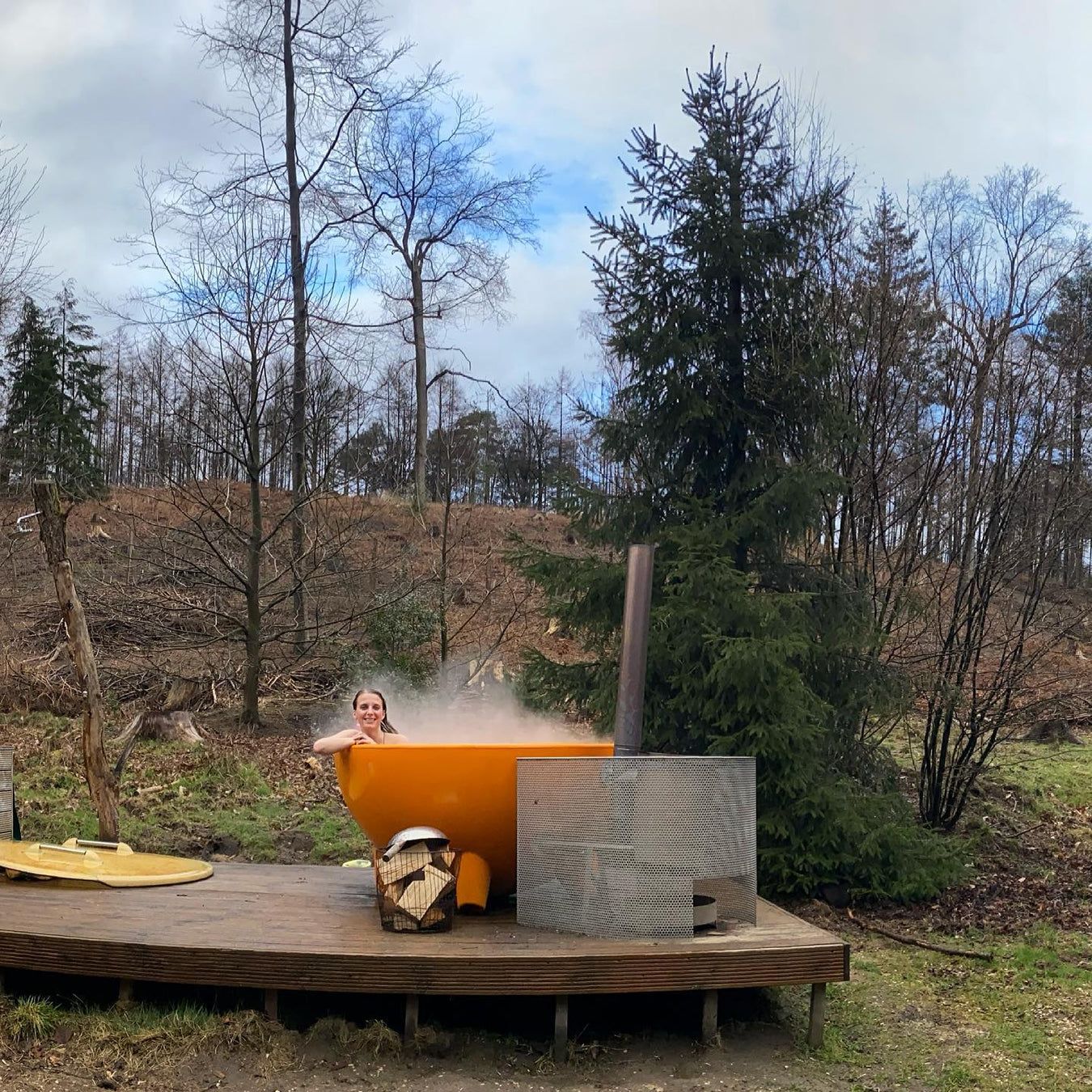 girl in hot tub in scottish forest