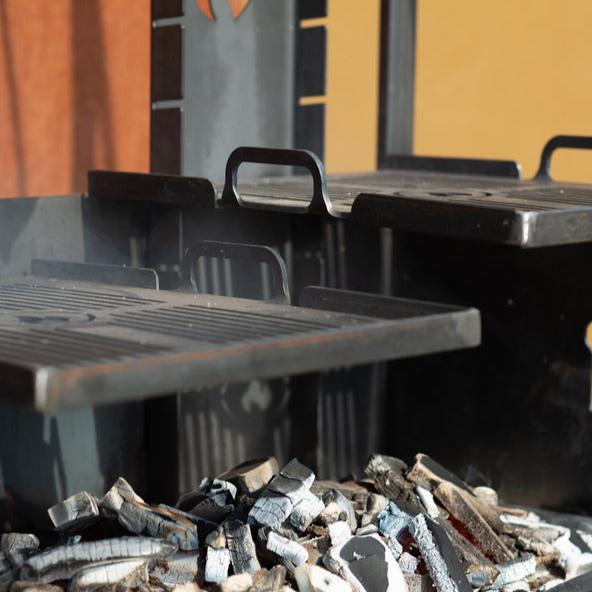Firepits UK Asado Doble Complete on patio adjustable grills close up