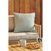 Cosipillow Heated Comfort Square 50x50cm Green on sofa