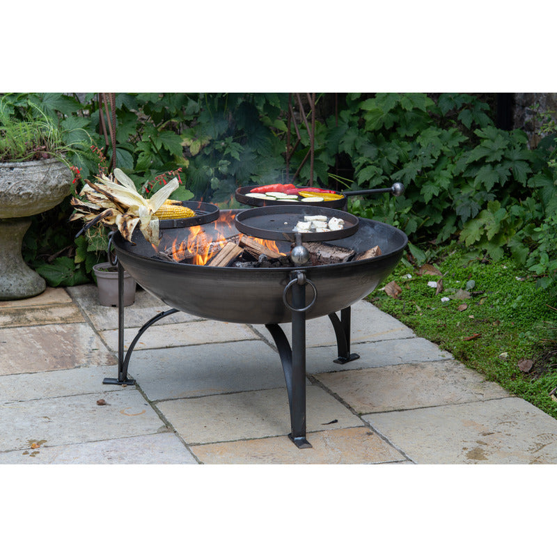 Firepits UK Plain Jane 90 with Three Swing Arm BBQ Racks with food