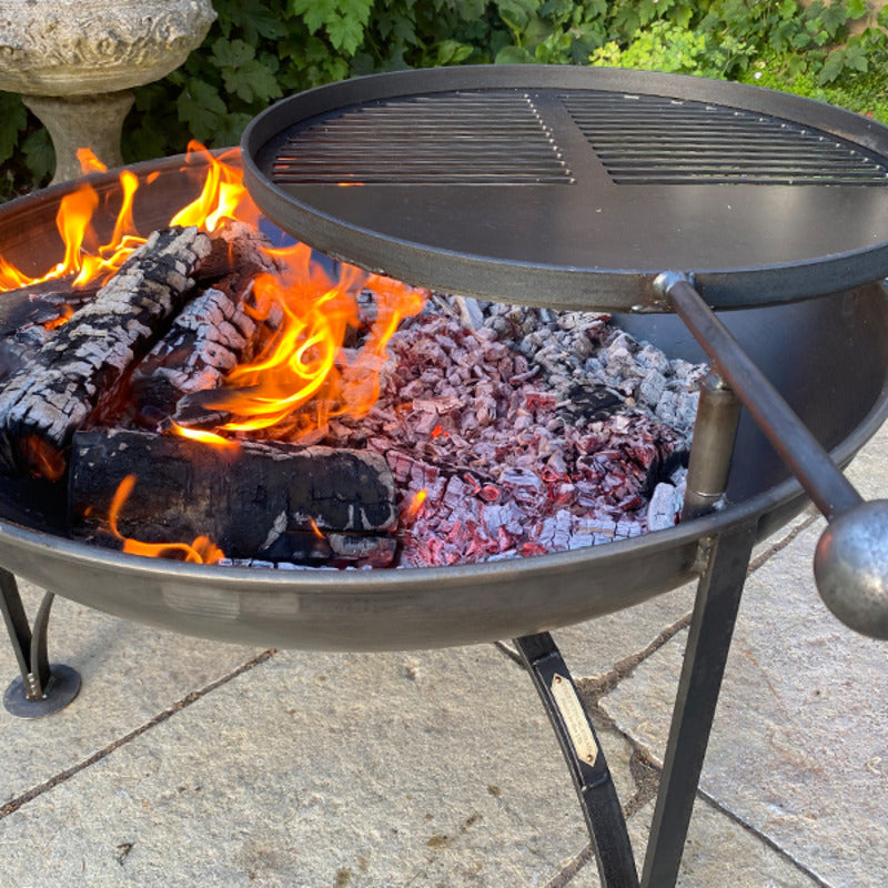 Firepits UK Plain Jane with Swing Arm BBQ Rack Fire Pit Collection close up on embers