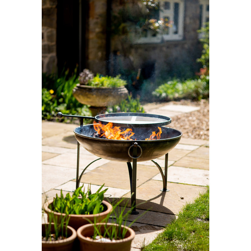 Firepits UK Plain Jane with Swing Arm BBQ Rack Fire Pit Collection no food, flames raging