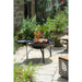 Firepits UK Plain Jane with Swing Arm BBQ Rack Fire Pit Collection no food, logs burning