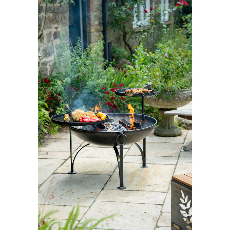 Firepits UK Plain Jane with Swing Arm BBQ Rack Fire Pit Collection with chicken skewers on warming swing arm