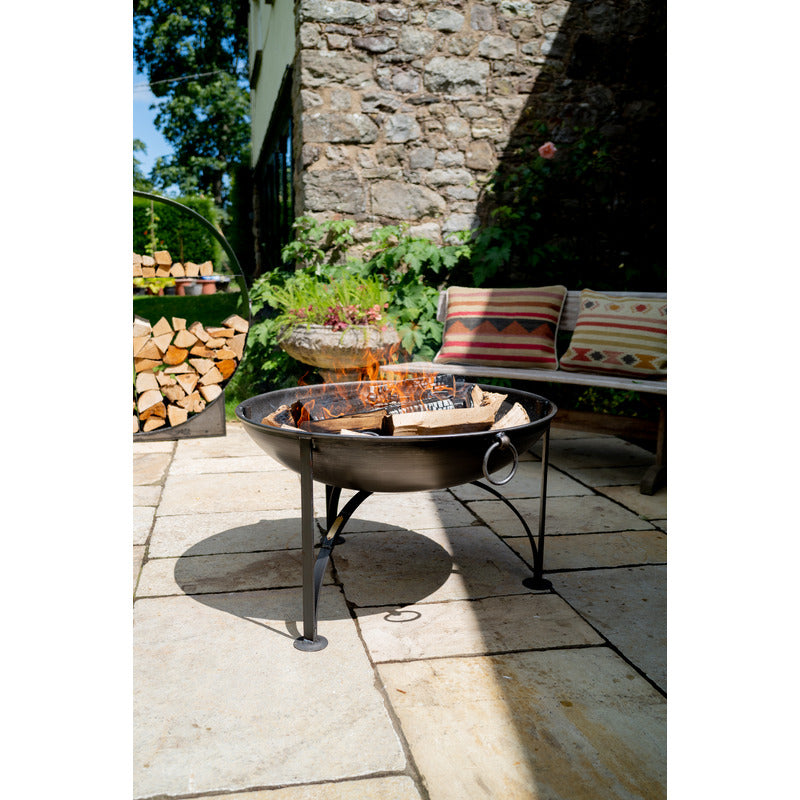 Firepits UK Plain Jane with Swing Arm BBQ Rack Fire Pit Collection with seating close up on patio