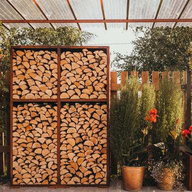 GrillSymbol Corten Steel Modular Shelf WALL-2 close up on patio with logs