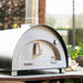 Igneus Pro 600 wood-fired pizza oven garden view with flowers