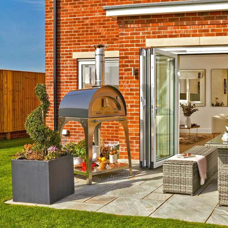 Igneus Pro 600 wood-fired pizza oven garden view on stand