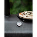 Firepits UK Table Top Pizza Oven with Turntable showing temperature gauge and cooked pizza