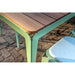 close up of bended table in green corner