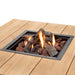 close up of flames on cosipure fire table teak top