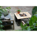cosiloft 100 fire pit table teak top garden lifestyle with chairs
