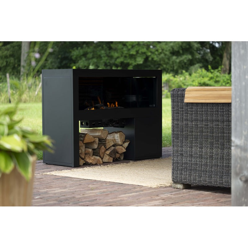 cosivista 120 outdoor fireplace angled view in garden with back insert