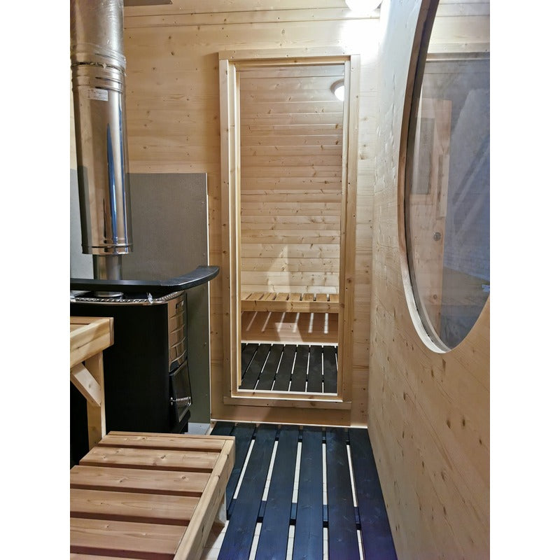 hobbit sauna cabin inside glass door and heater view