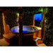 night time view of elite tub with spa system