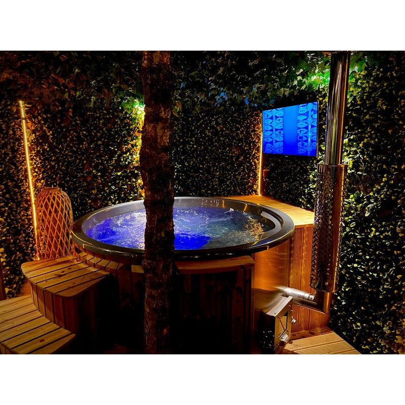 night time view of elite tub with spa system