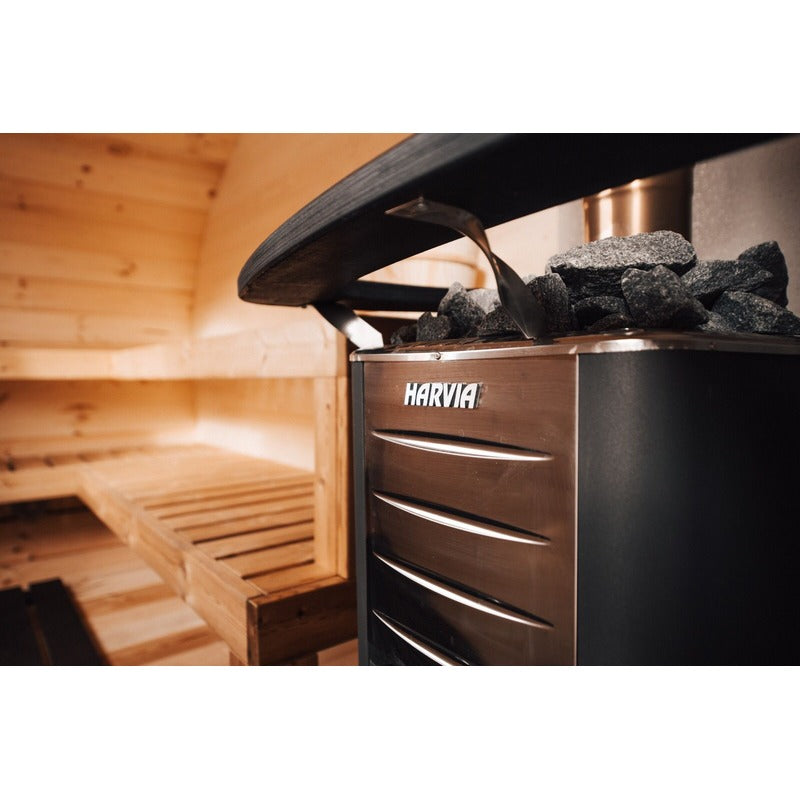 side view close up of harvia heater in barrel sauna