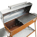 studio view of grill symbol charcoal grill lid open with griddle