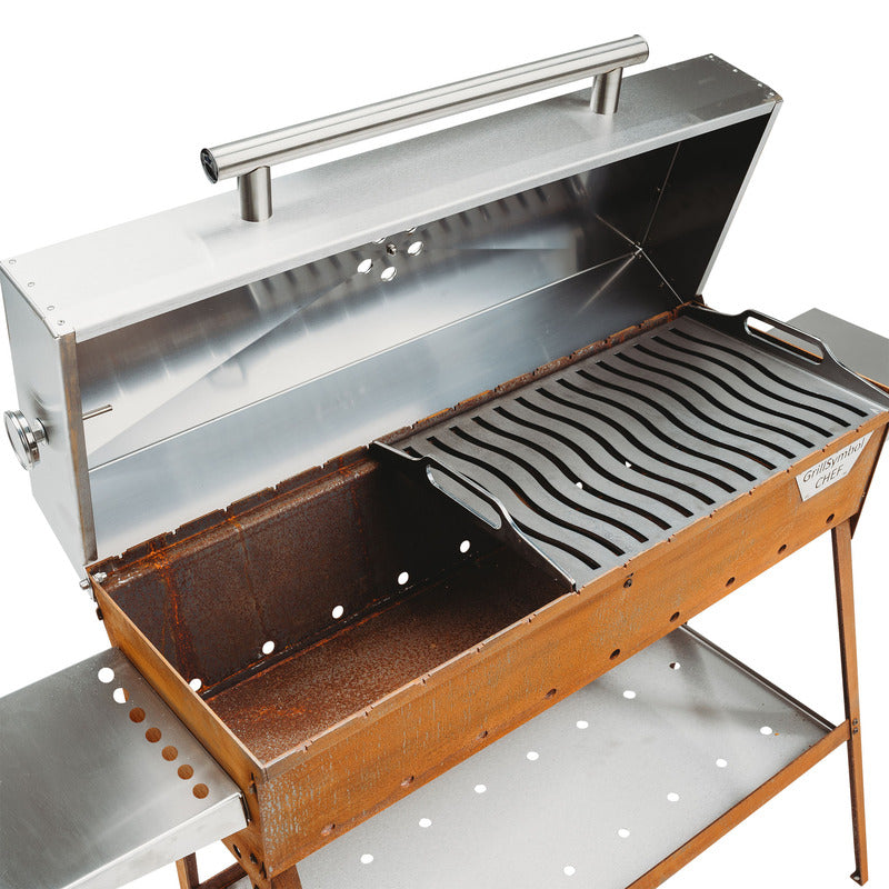 studio view of grill symbol charcoal grill lid open with griddle